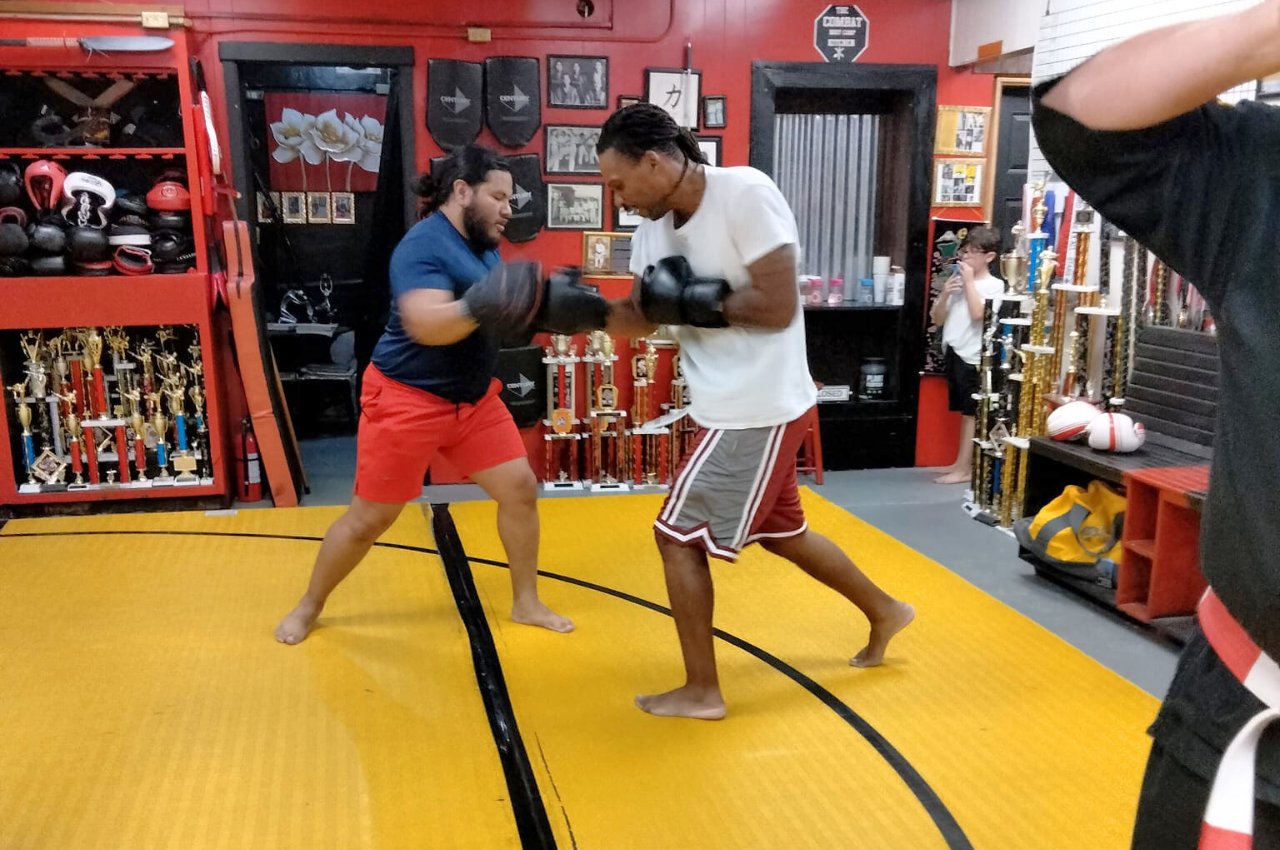 Martial arts instructor with kids