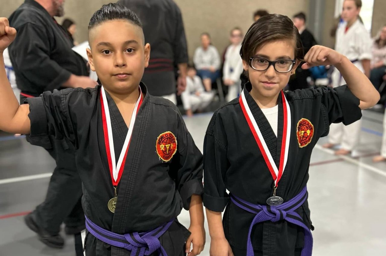 Martial arts instructor with kids