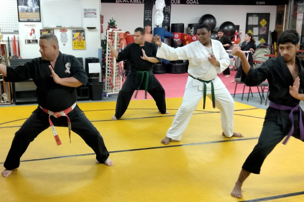 Martial arts instructor with kids