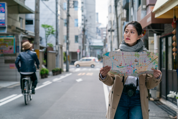 Woman lost using map Woman lost using map