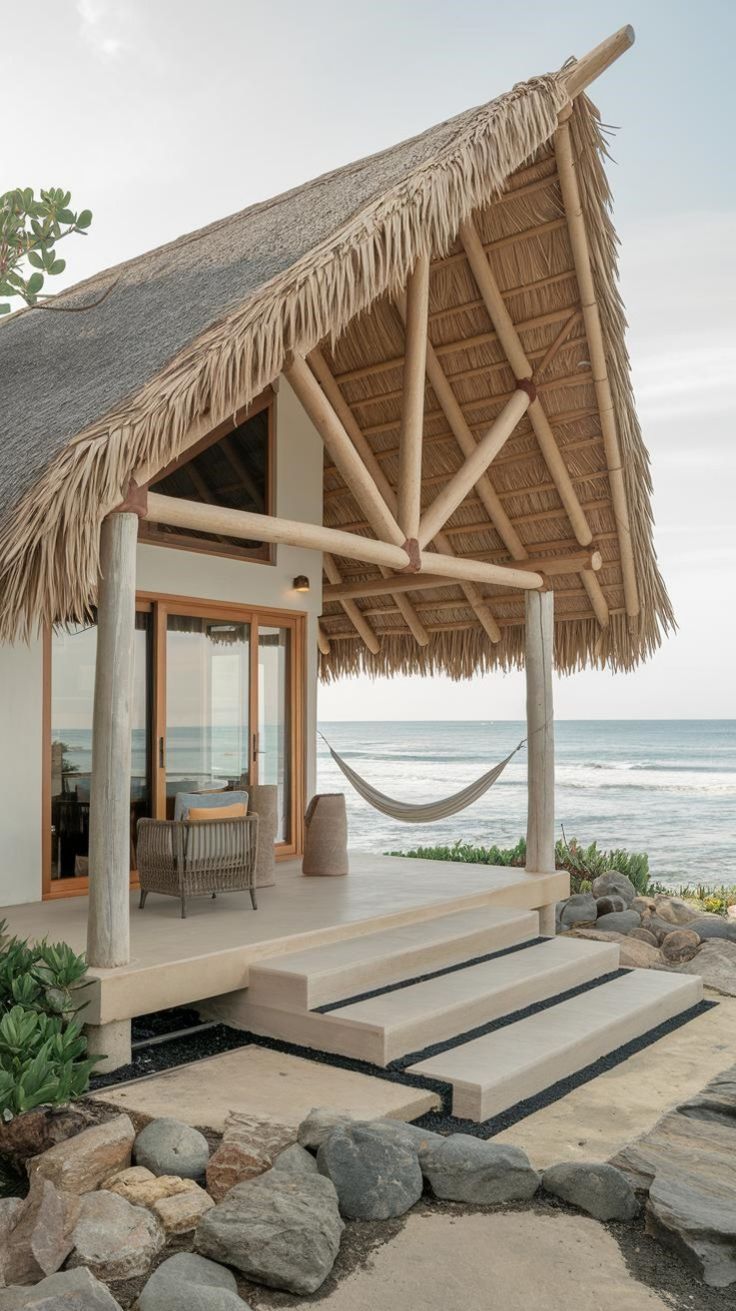 Thatched eco-bungalow in Sumba built with bamboo and local materials for sustainable living. Thatched eco-bungalow in Sumba built with bamboo and local materials for sustainable living.