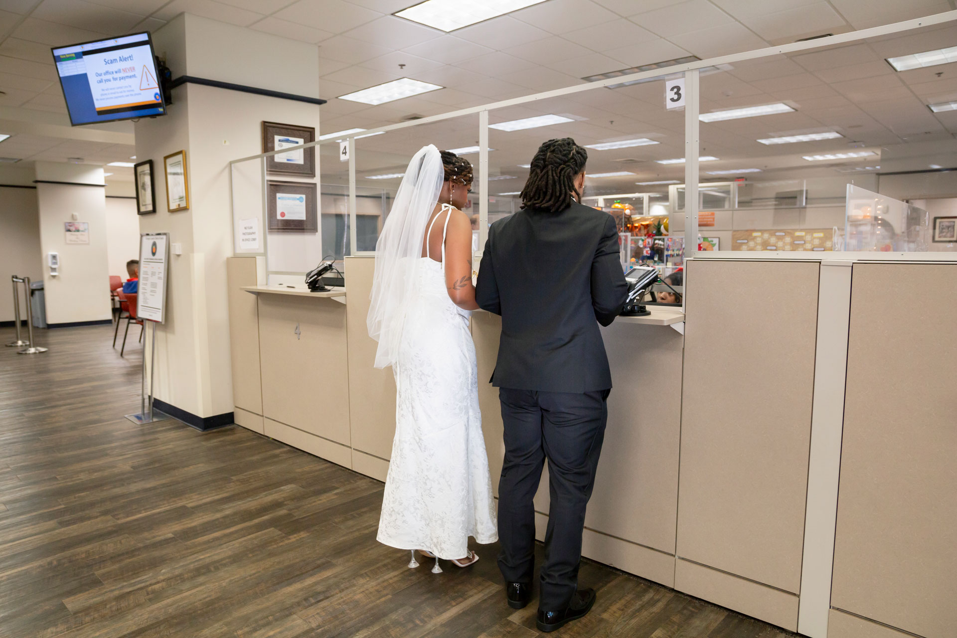 waiting inside Orlando courthouse for their wedding ceremony waiting inside Orlando courthouse for their wedding ceremony