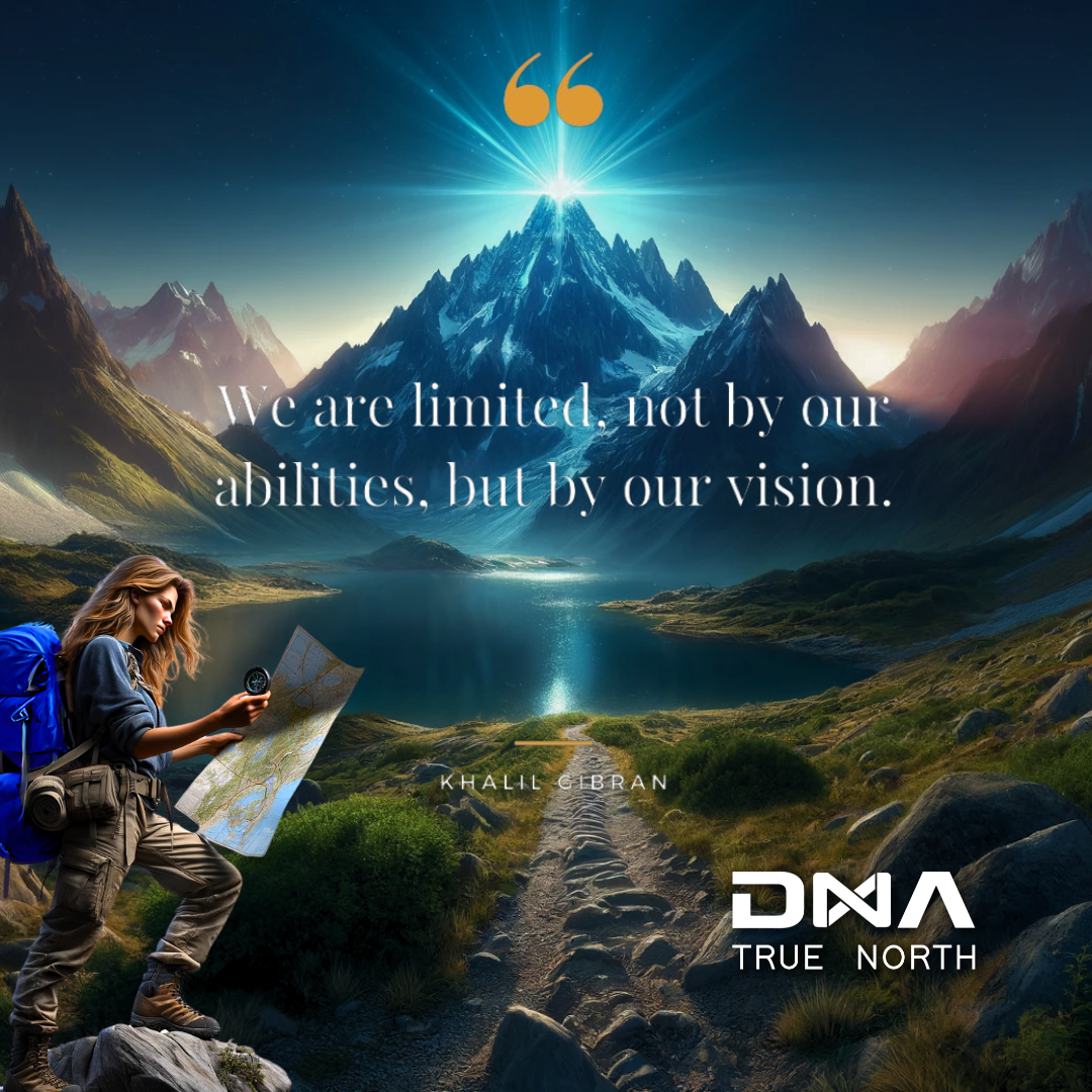 A woman with long blonde hair, dressed in outdoor gear, stands on a mountain path overlooking a serene lake surrounded by majestic mountains. She holds a compass and a map, symbolizing navigation and purpose. The scene is set at dawn, with the sun's rays illuminating the mountain peak, which is crowned with a glowing blue light. The quote "We are limited, not by our abilities, but by our vision" by Khalil Gibran is overlaid on the image, reflecting the theme of limitless potential. The DNA True North logo is positioned at the bottom right corner, reinforcing the brand's message of guiding individuals towards their true purpose.