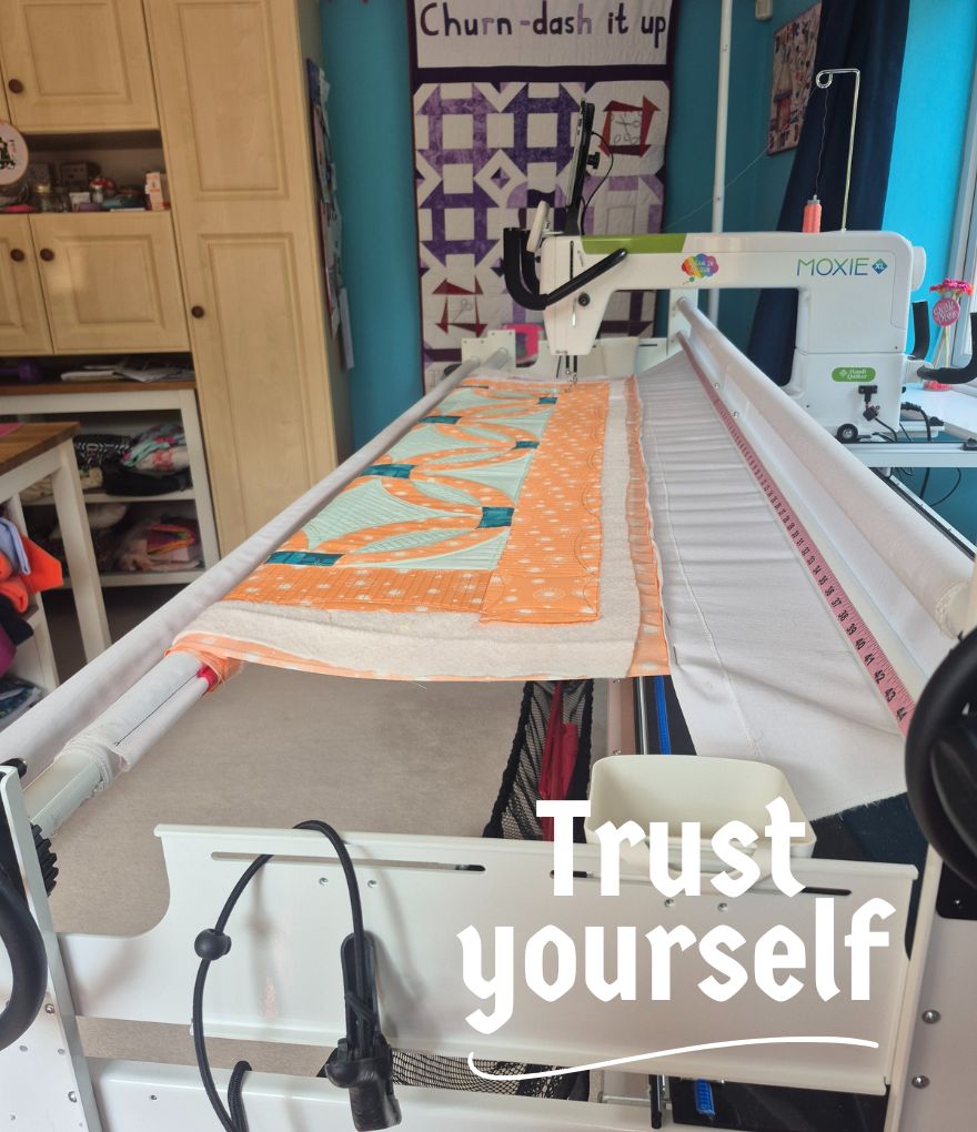 Double Wedding Ring quilt loaded on longarm machine Moxie XL, after digital quilting. Double Wedding Ring quilt loaded on longarm machine Moxie XL, after digital quilting.