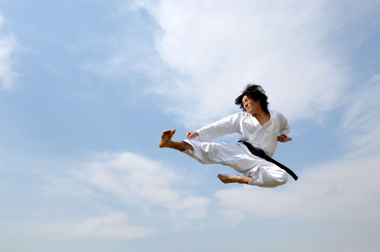 Martial arts instructor with kids