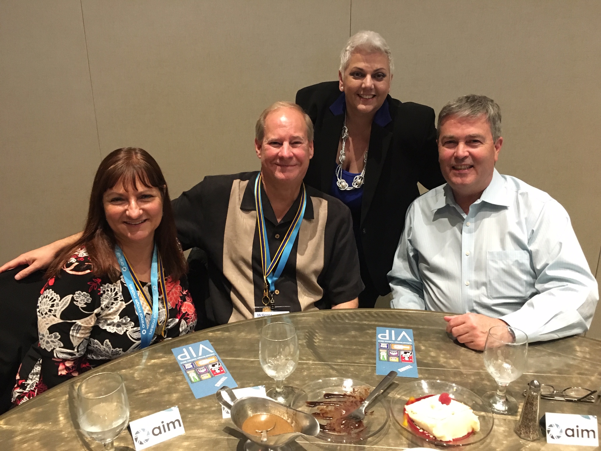 Kim Buccheri with the award-winning Connie and Bob Zimmerlich (left) and Brad Cansler (right)