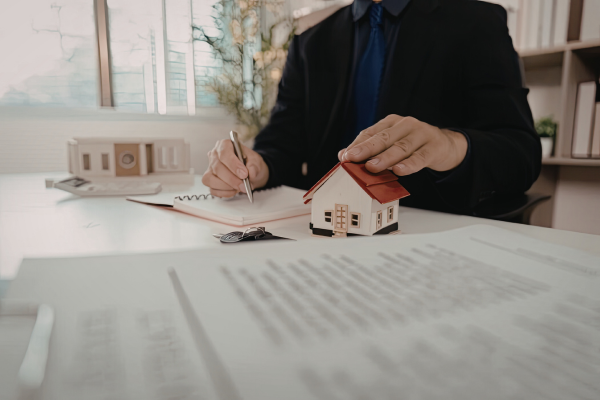 couple reviewing documents kitchen table couple reviewing documents kitchen table