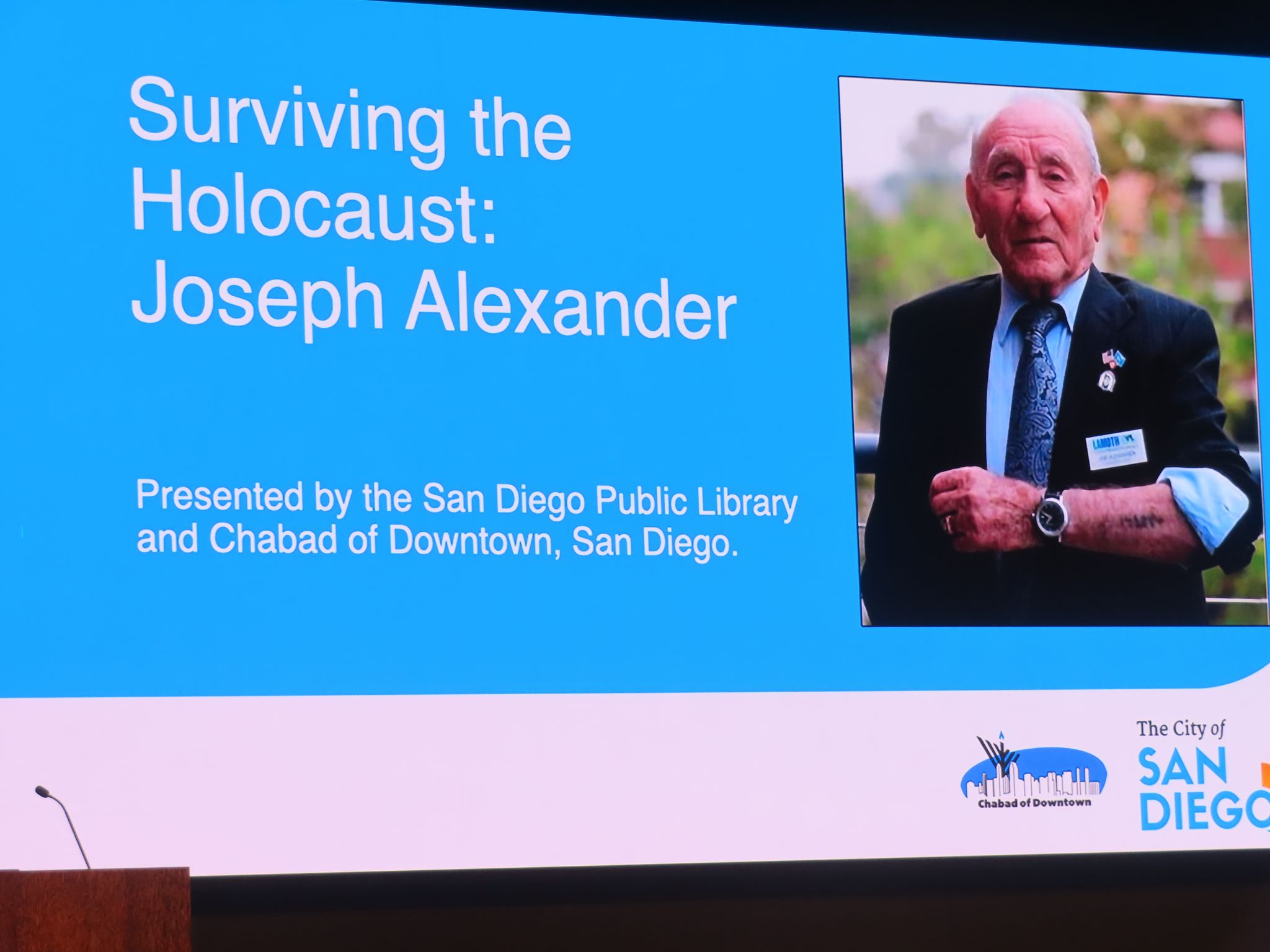 Joseph Alexander speaking at community event