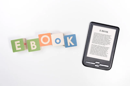 Colourful blocks spelling eBook alongside an e-reader device – representing digital distribution channels for authors