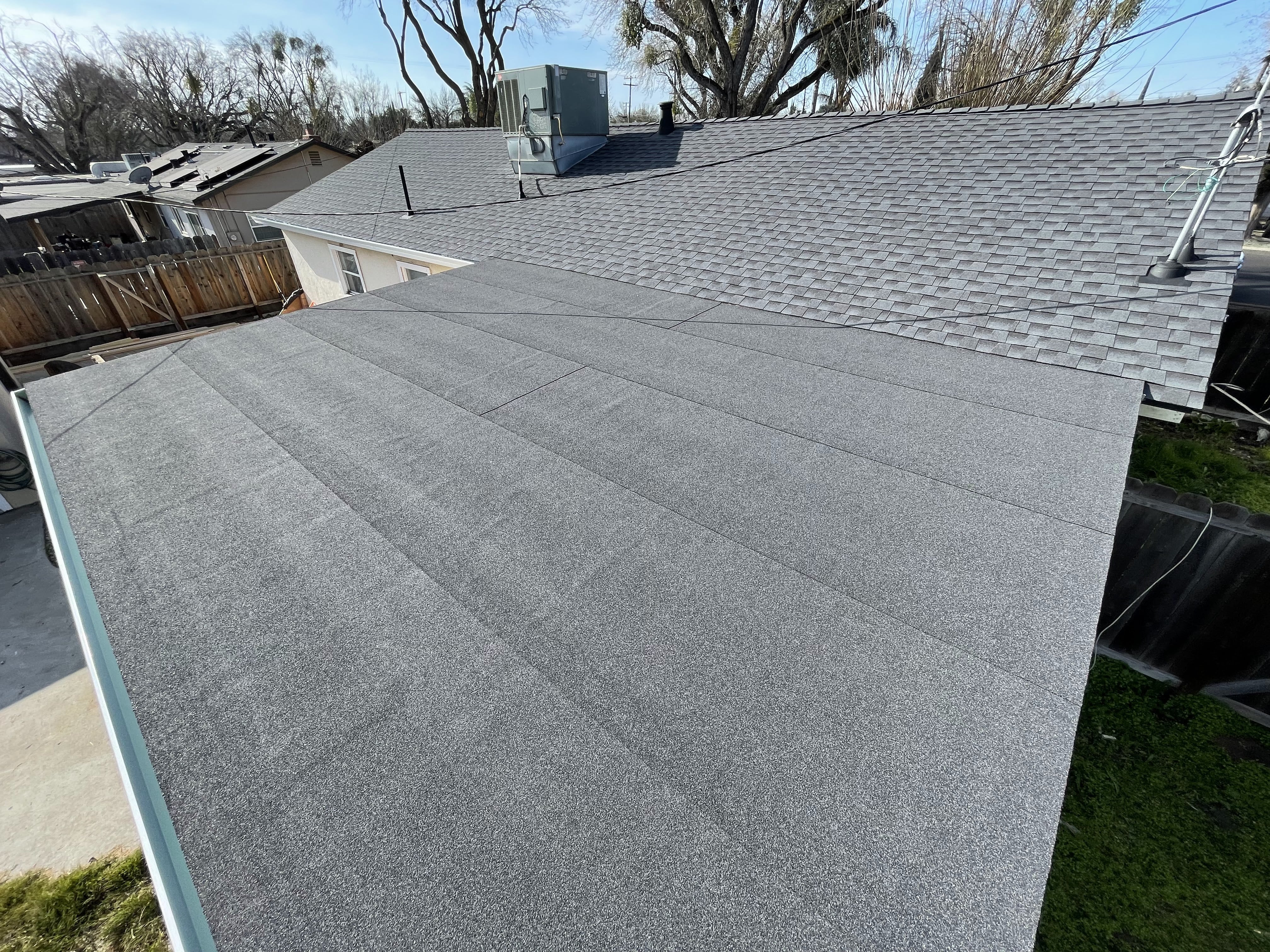 roofer repairing the roof