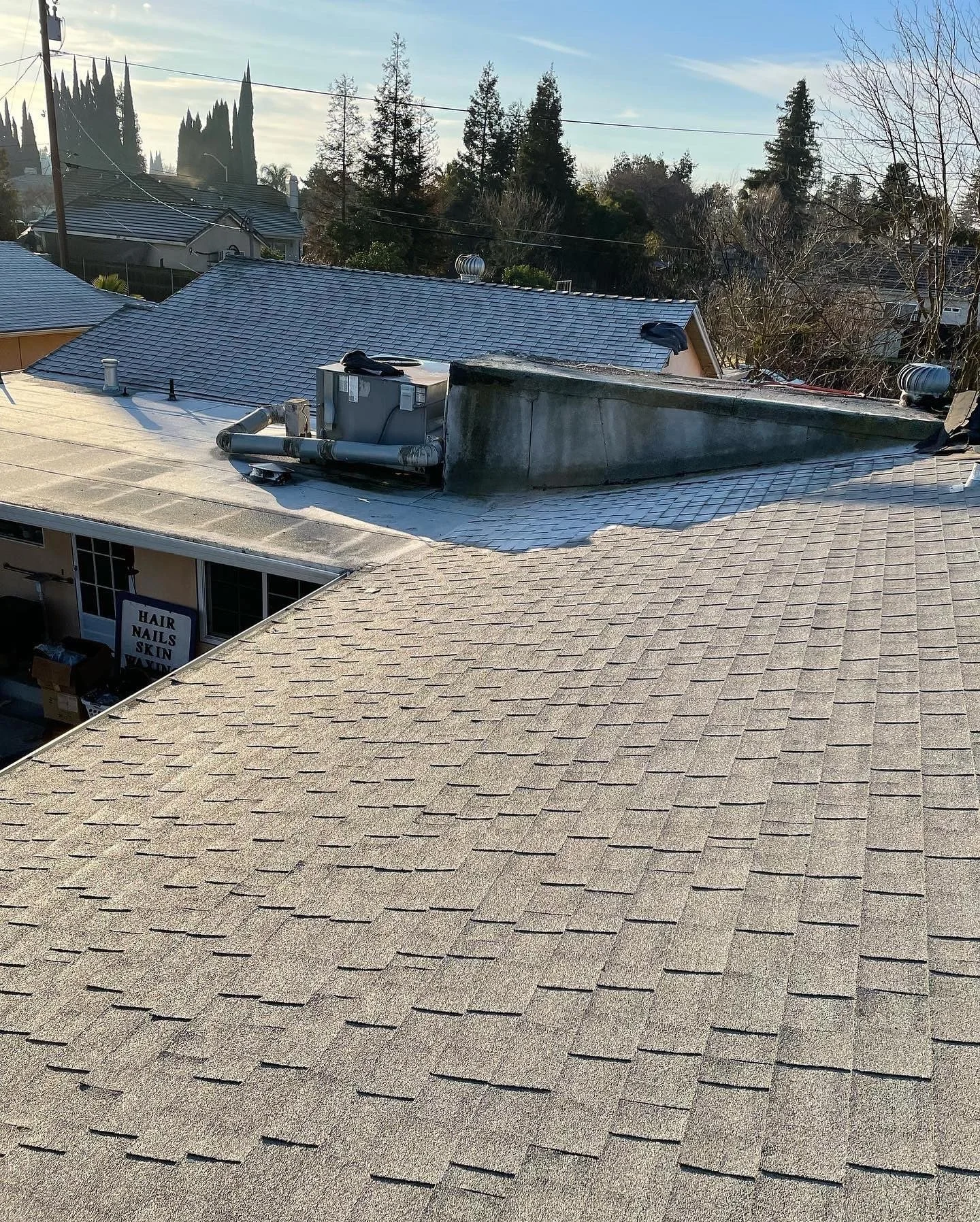 expert roofer working on the residential property