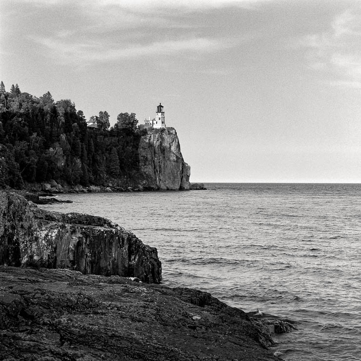 Black and white photograph of Split Rock Lighthouse in Minnesota with angled sunlight, demonstrating controlled highlights and shadows using the Zone System. Black and white photograph of Split Rock Lighthouse in Minnesota with angled sunlight, demonstrating controlled highlights and shadows using the Zone System.