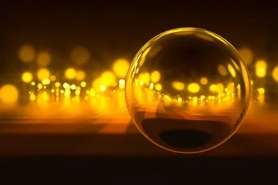 A person surrounded by a golden bubble of light