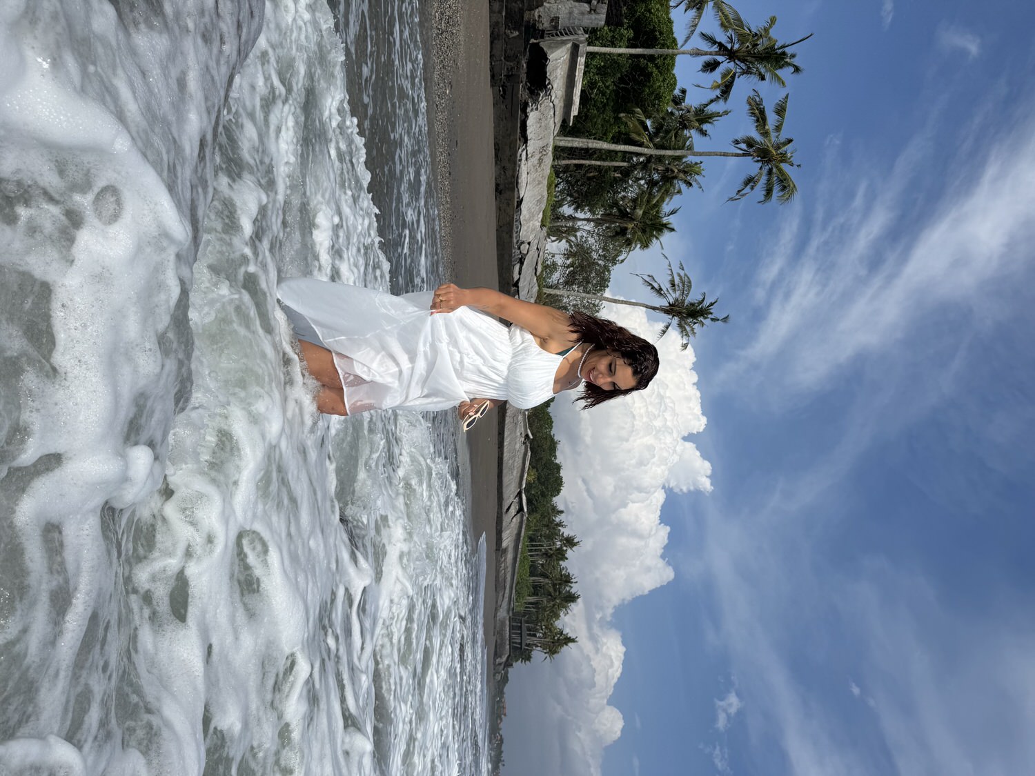 canggu beach bali woman with white dress at beach
