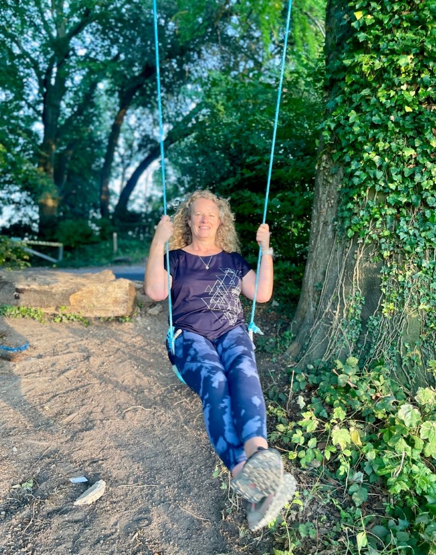 Heather enjoying the freedom of swinging - embracing joy without apology. Heather enjoying the freedom of swinging - embracing joy without apology.