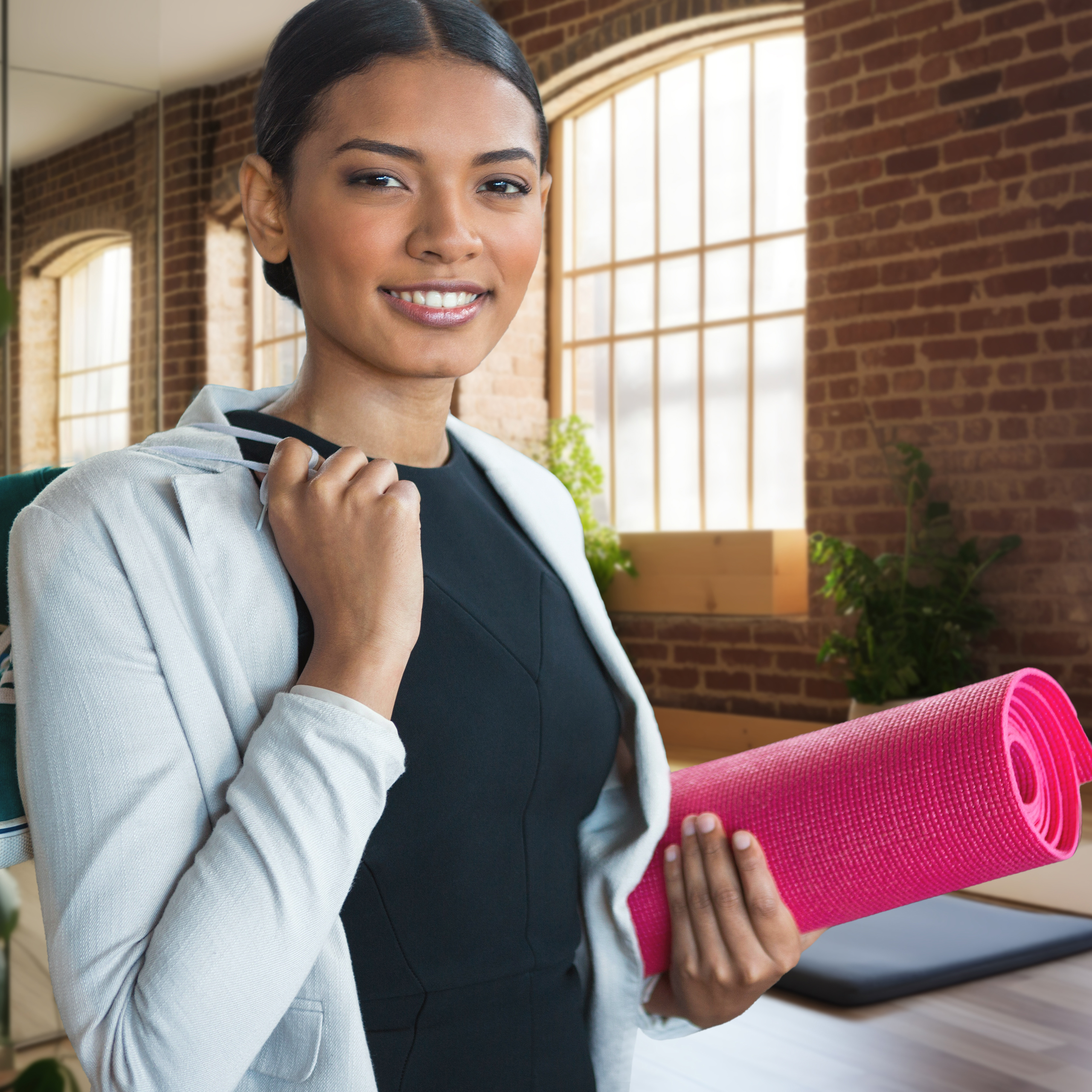 headshot of a yoga instructor using a digital background of a yoga studio