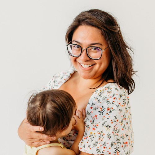 Dr. Sarah breastfeeds her daughter