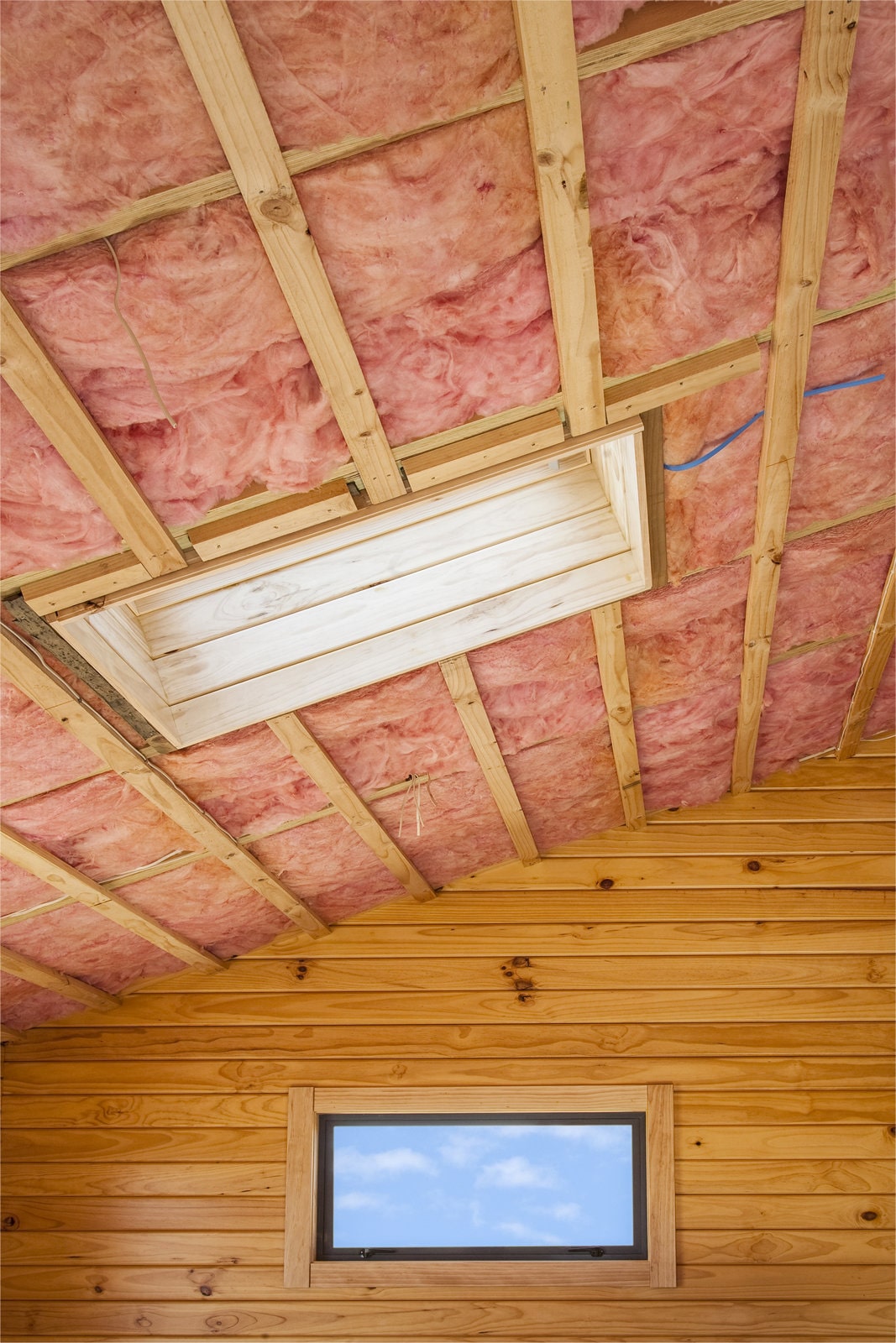 expert roofer carefully installing gutter