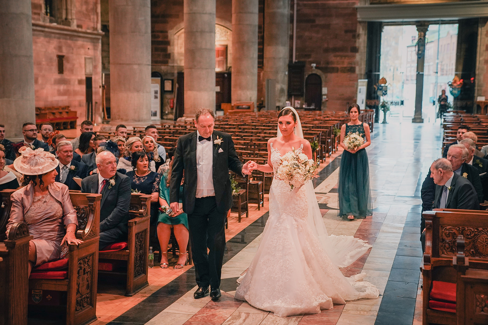 Bride walking down the aisle at St Anne’s Cathedral Belfast