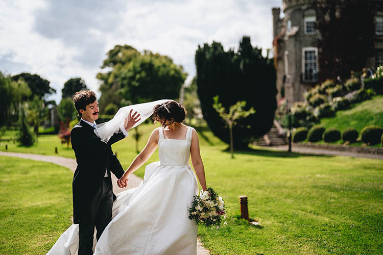 candid wedding photo at bellingham castle