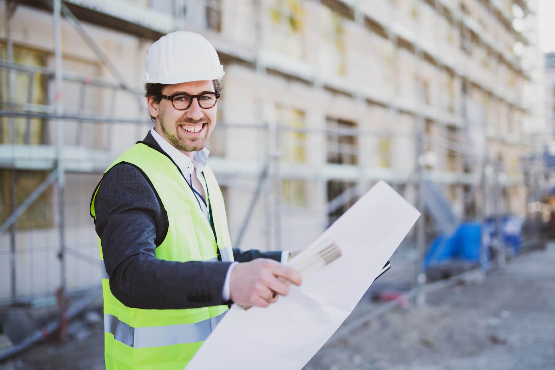 roofer smiling and looking at project