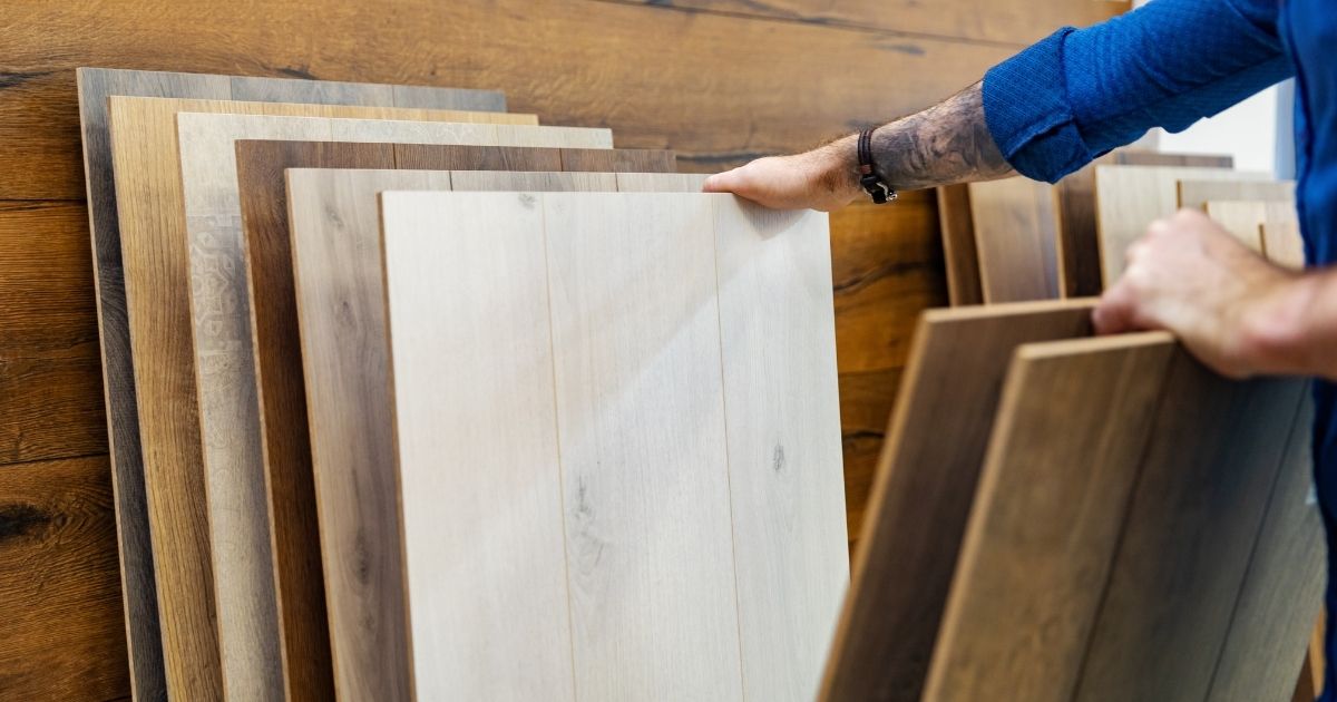 man choosing a kitchen flooring man choosing a kitchen flooring