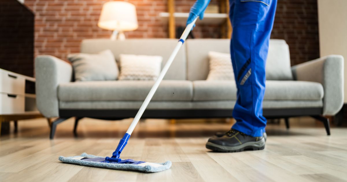 man mopping the floor man mopping the floor