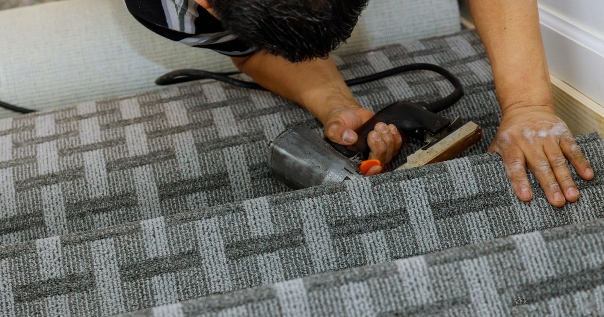 installing gray carpet