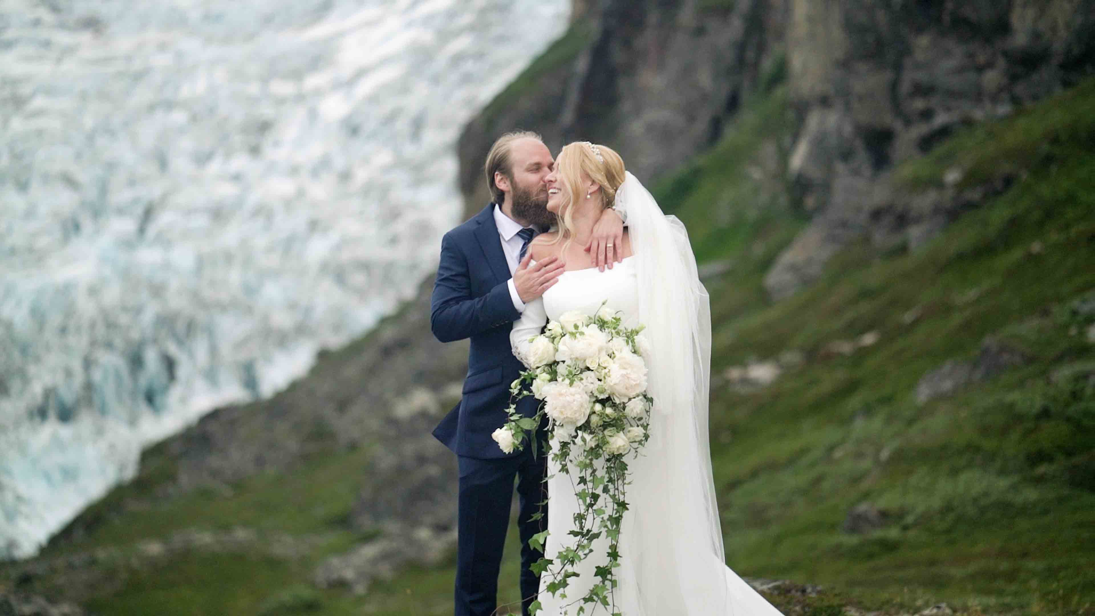 Kiss in front of glacial pool Kiss in front of glacial pool