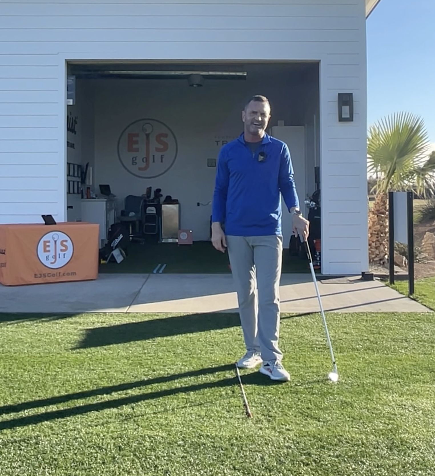 Coach Erik in front of EJS Golf Academy Coach Erik in front of EJS Golf Academy