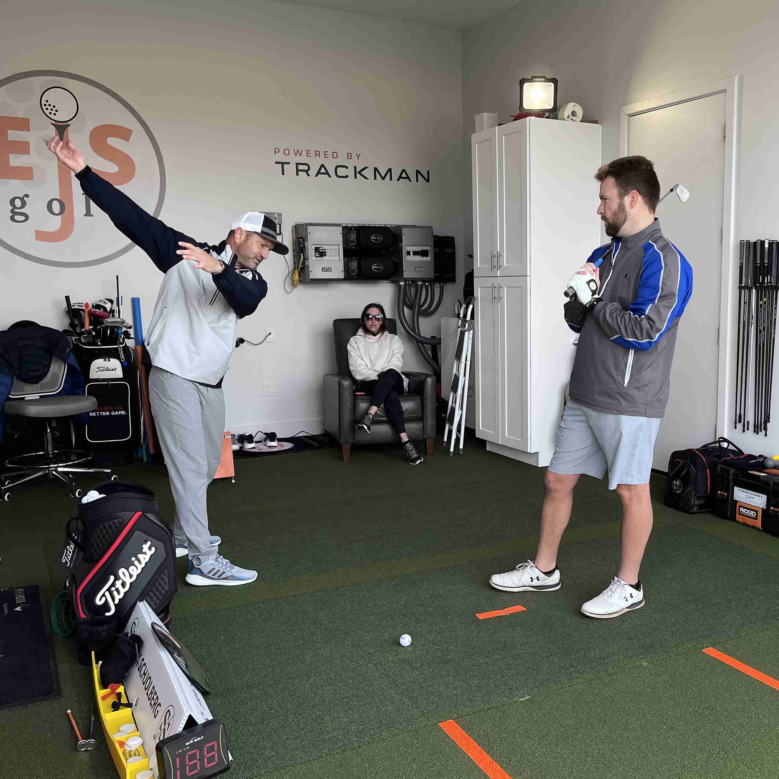 Me giving a golf lesson in my bay at EJS Golf Me giving a golf lesson in my bay at EJS Golf