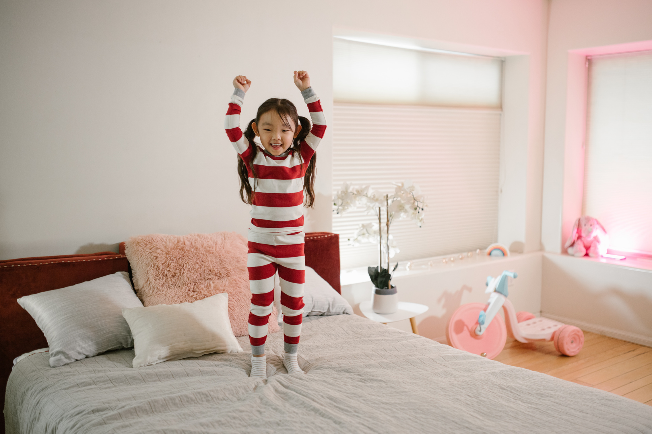 child bouncing on bed child bouncing on bed