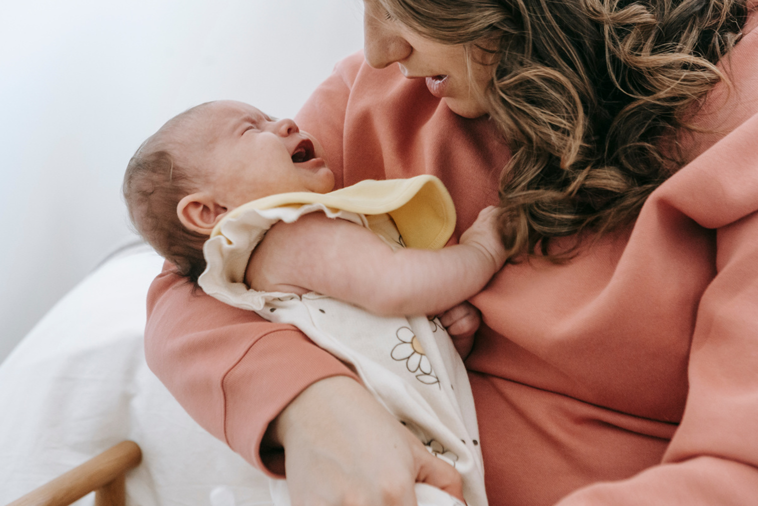 mother holding new born baby mother holding new born baby