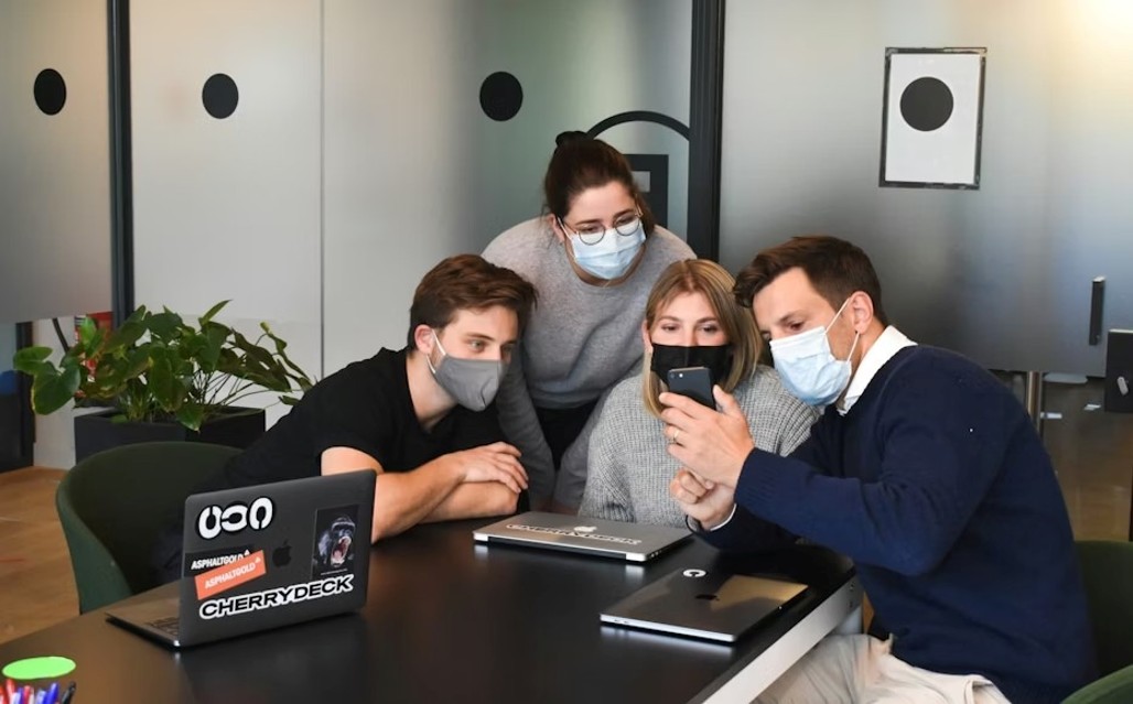 A group of people testing a product