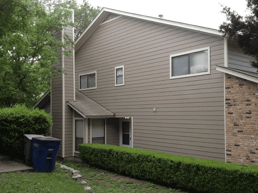 a house with newly installed siding as part of an exterior remodeling project.