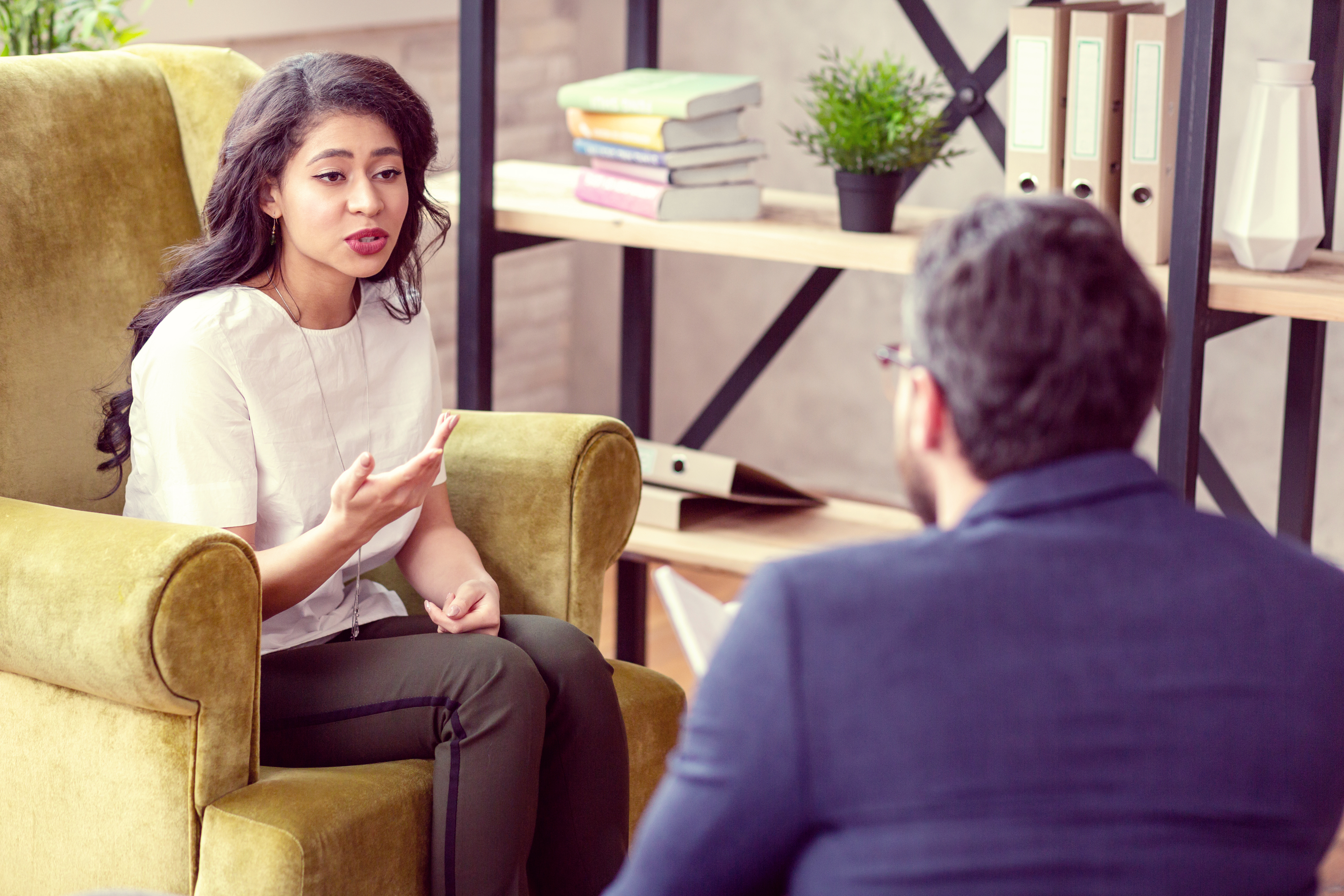 woman talking to her licensed counselor 