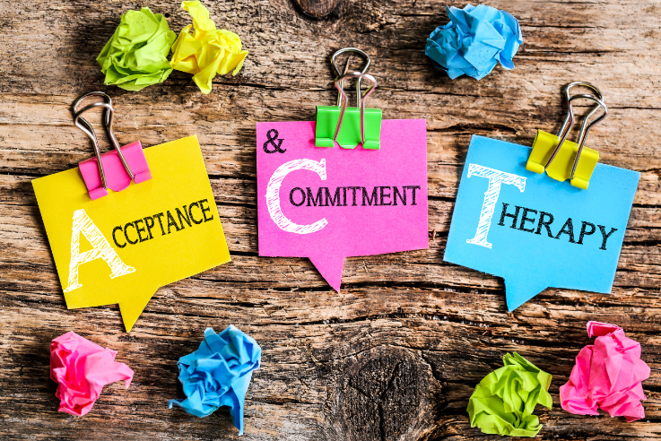 3 Sticky notes on a table showing each aspect of ACT therapy (Acceptance & Commitment Therapy)