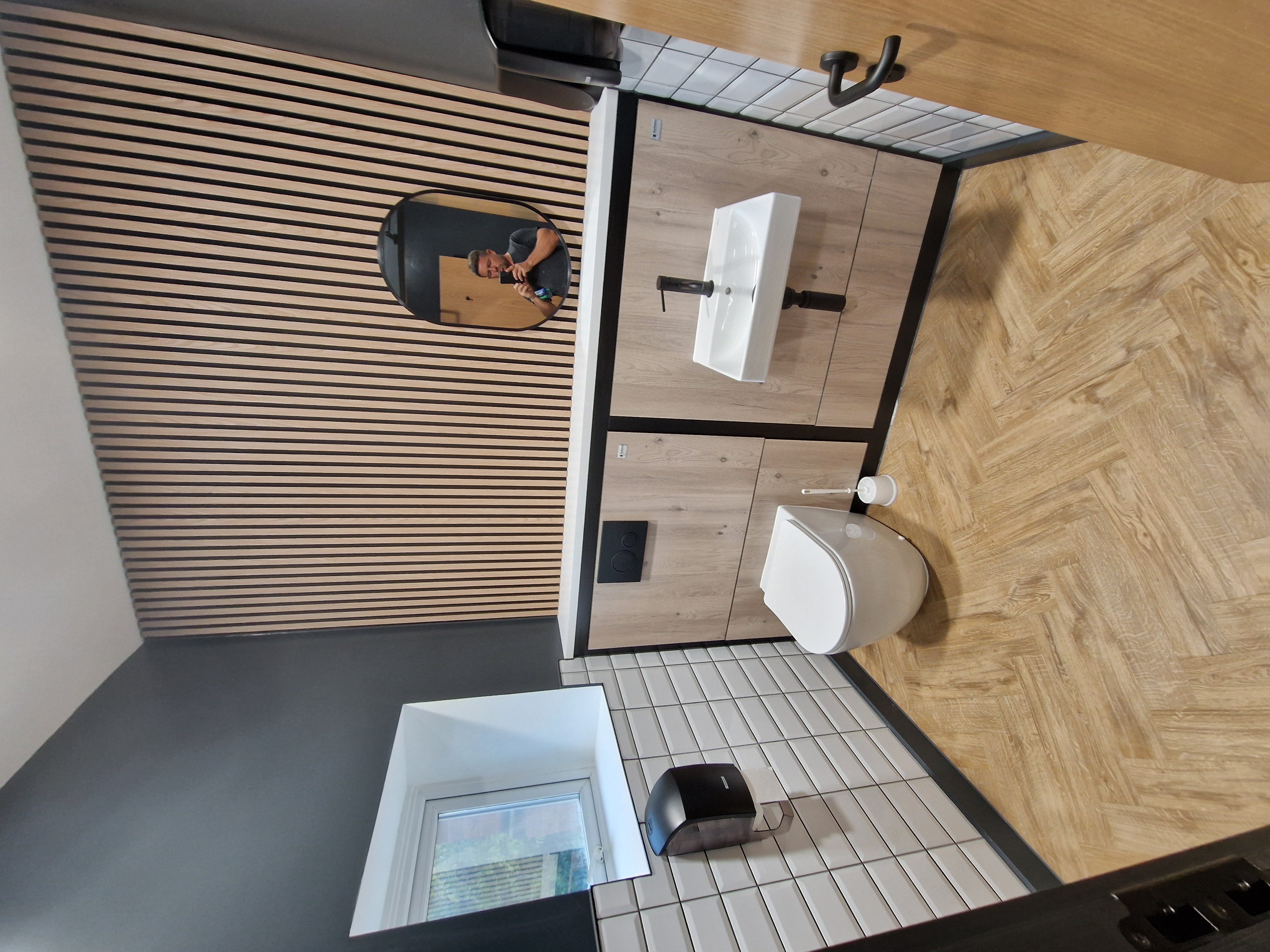 Dulwich SE22 — Refurbished school washroom with wall-hung WCs and modern fittings by Sable Projects.