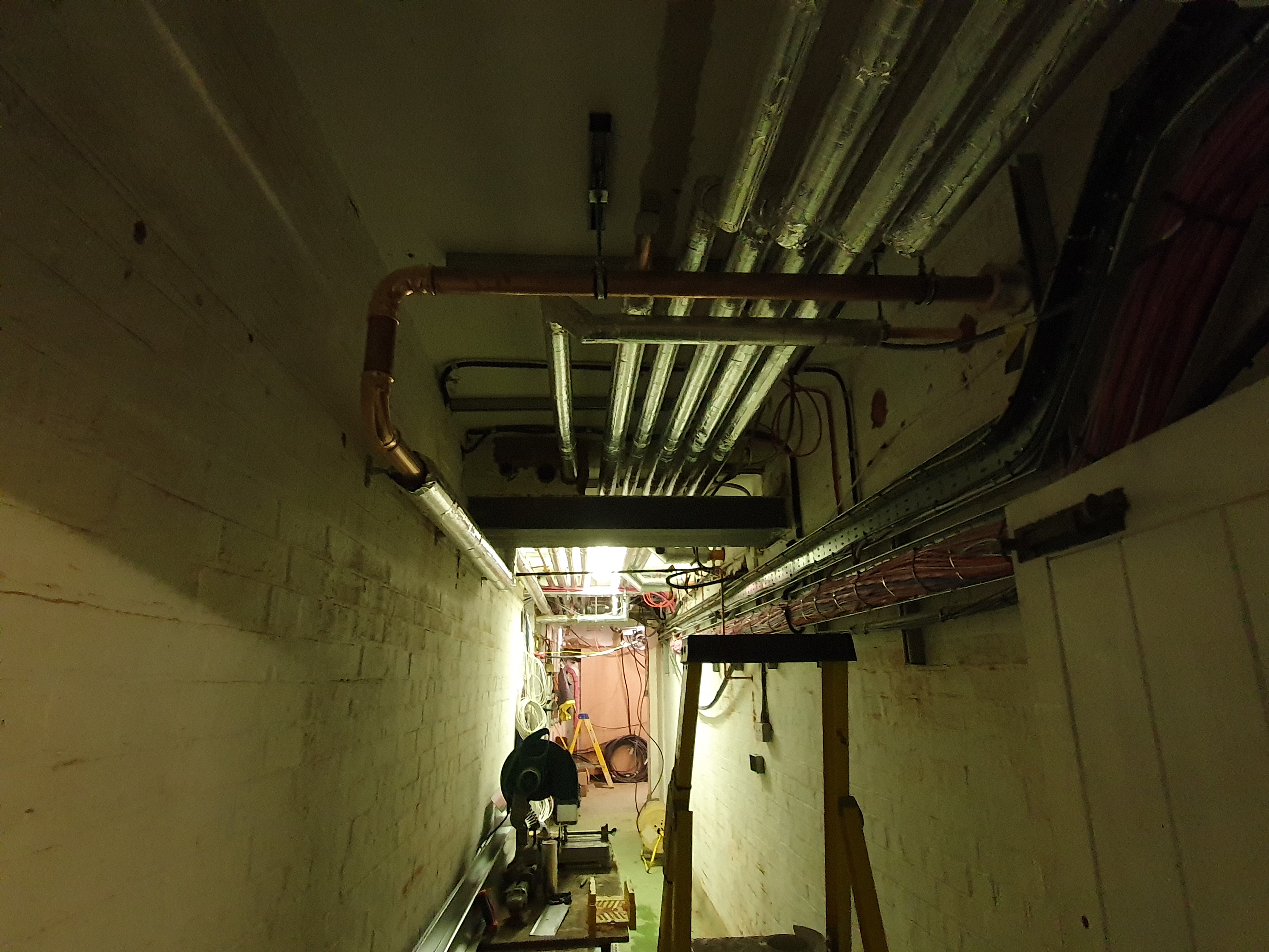 Steyning BN44 — careful pipe routing around heritage beams during installation.