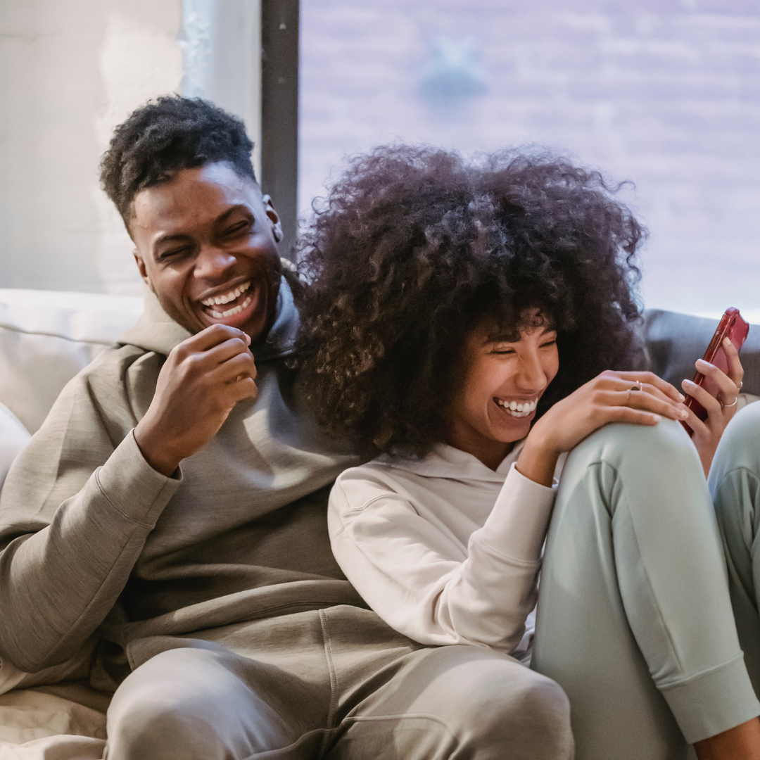 Happy customers looking at phone, looking at your website