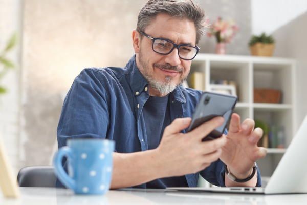 Man on phone taking love language quiz