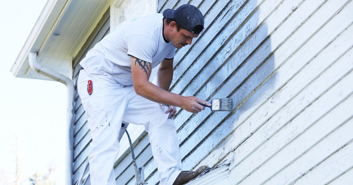 Man Painting House Exterior Man Painting House Exterior