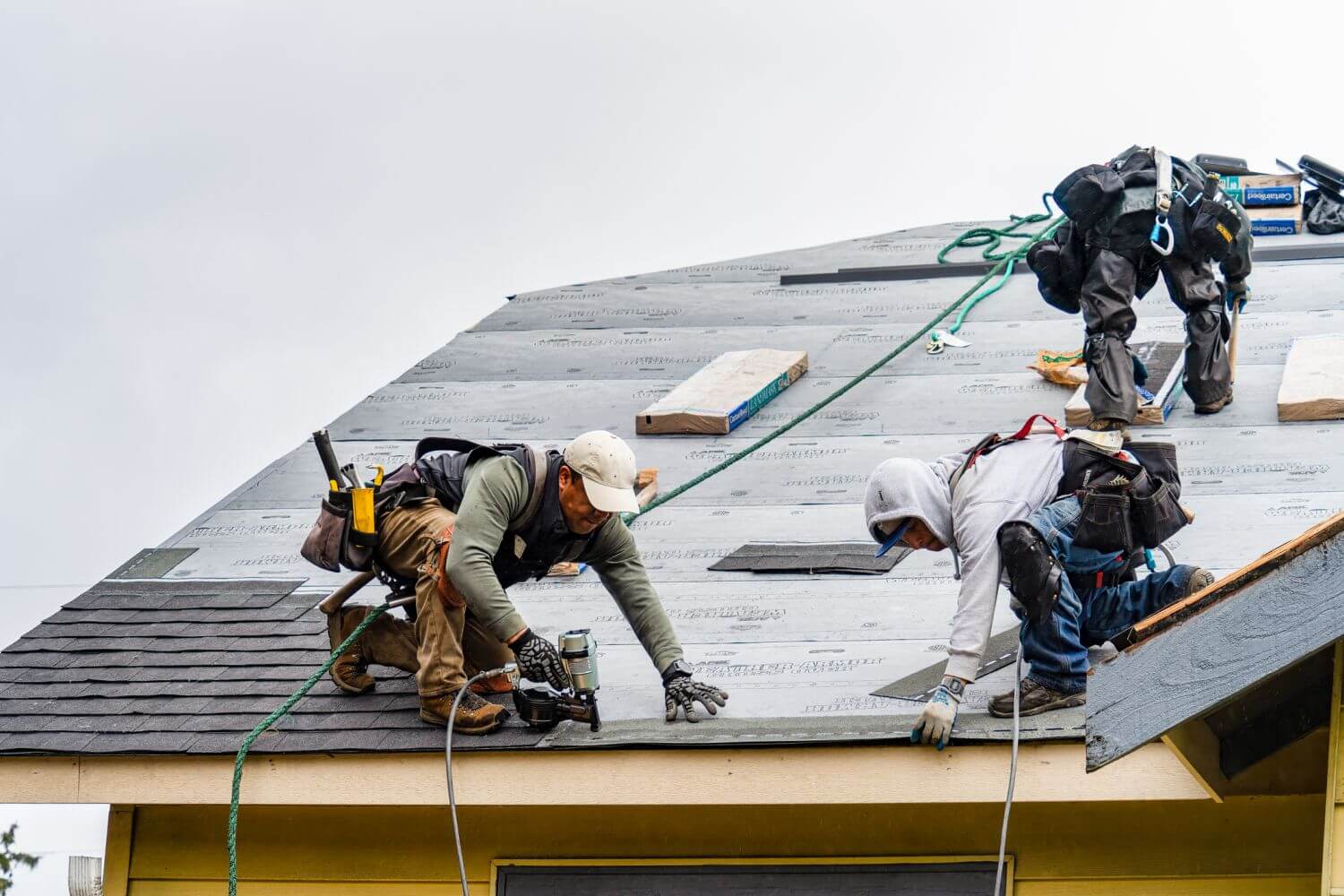 C&H Exterior Roofing contractor installing new roof