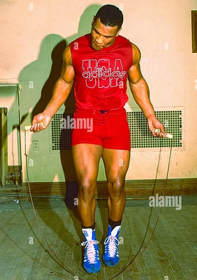Mike Tyson in his prime demonstrating the explosive, elastic footwork and lightning-fast ankle response that defined his early heavyweight destroyer era
