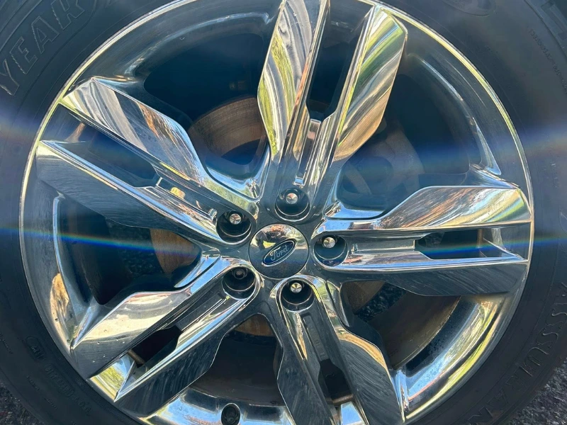 Signature detail clean wheels and dressed tires after service