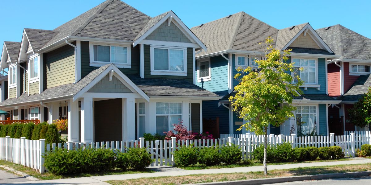 a big house with beautiful fence