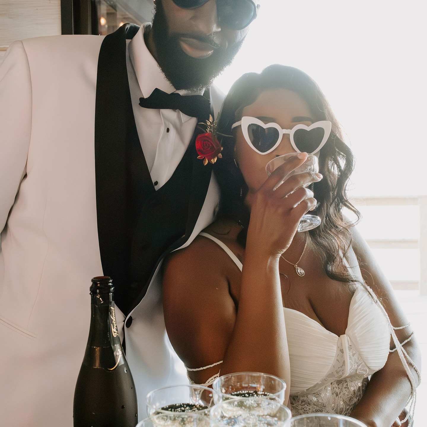 Bridal portrait against neutral wall