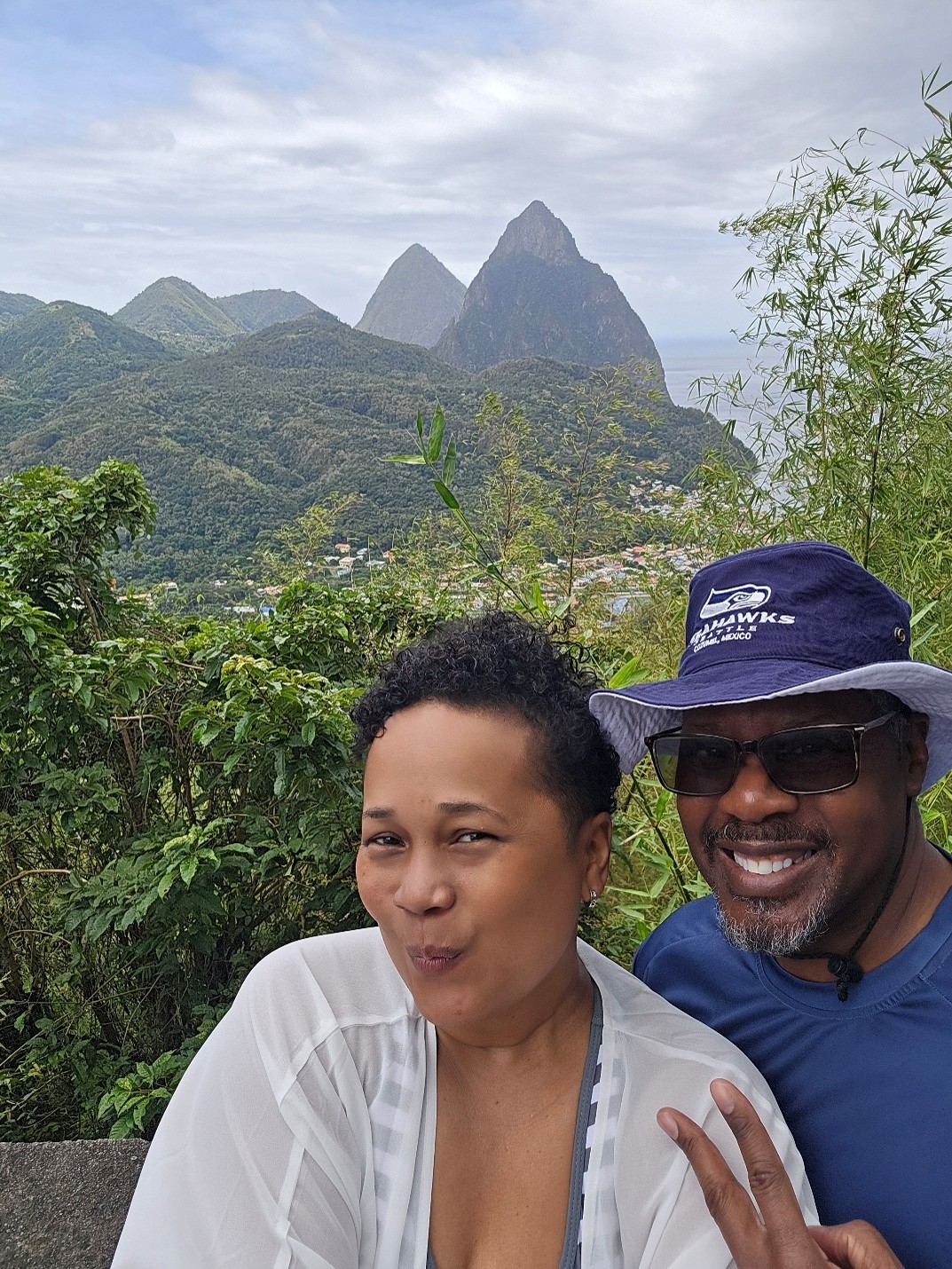 St. Lucia highlights – scenic views of Marigot Bay, the colorful charm of Soufrière, and tranquil nature at Morne Coubaril Estate in the Caribbean.