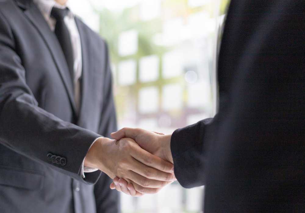 Handshake following acceptance of a deal Handshake following acceptance of a deal