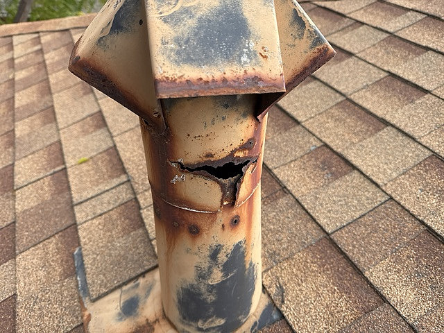 rusted gas combustion vent